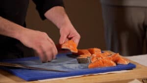 Cut fish into 1 inch strips