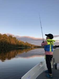 Young boy fishing