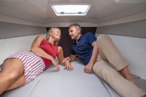 Legend Boats - couple in cuddy cabin